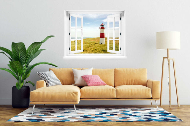 dekoli-wandtattoo-fenster-mit-blick-auf-leuchtturm-über-sofa